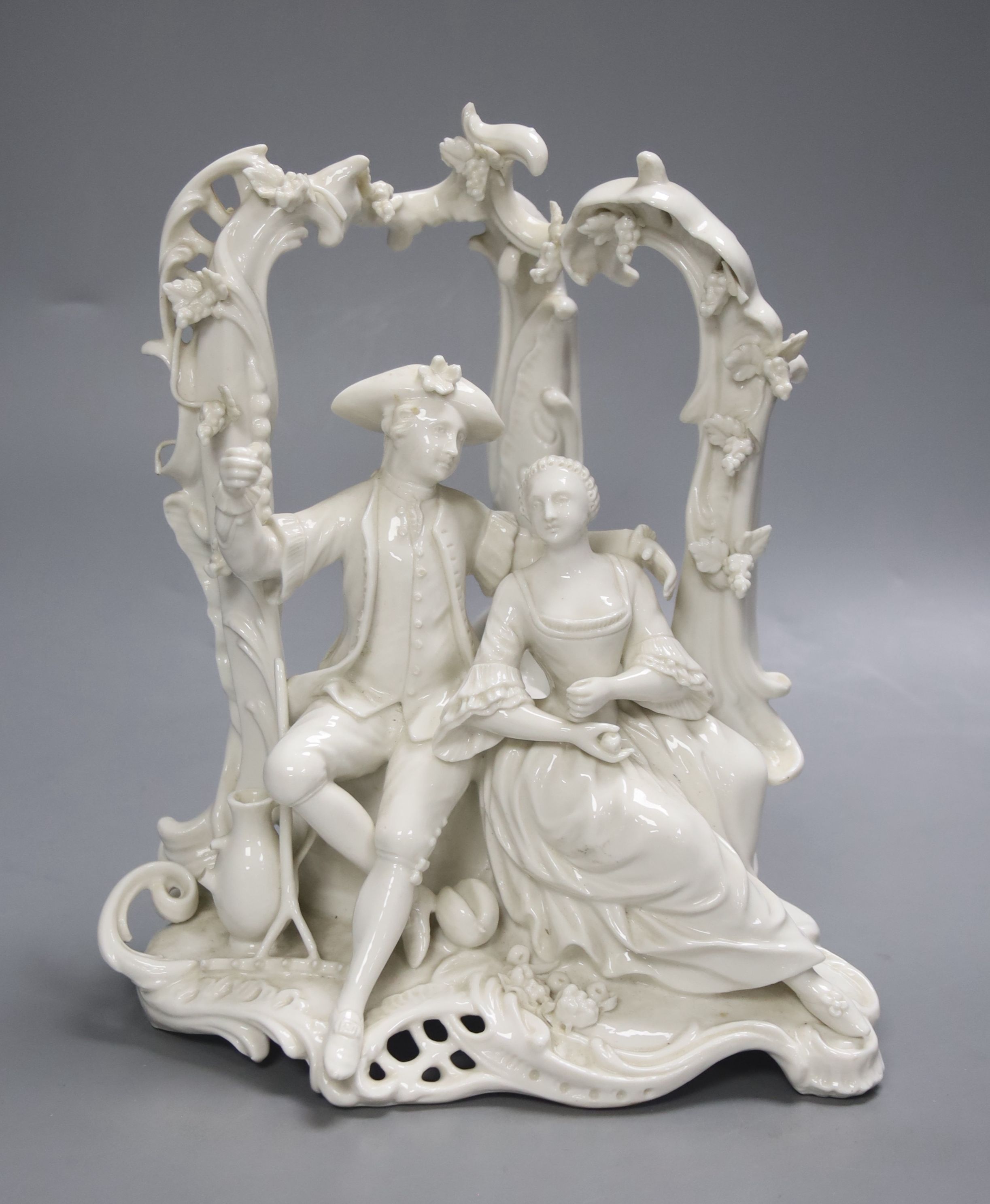 A Nymphenburg white glaze arbour group, 23cm high